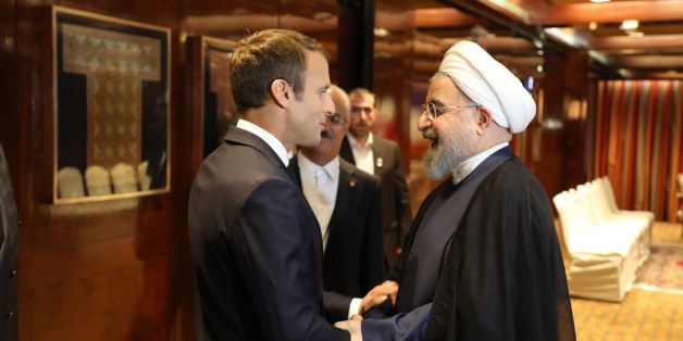 France's president Emmanuel Macron (L) greets Iranian president Hassan Rouhani at the Millennium Hotel near the United Nations on September 18, 2017, in New York. / AFP PHOTO / LUDOVIC MARIN (Photo credit should read LUDOVIC MARIN/AFP/Getty Images)