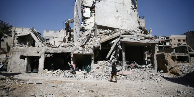Abu Mohammad Alaya's building is seen damaged in Douma, Syria March 2, 2018. Picture taken March 2, 2018. REUTERS/Bassam Khabieh