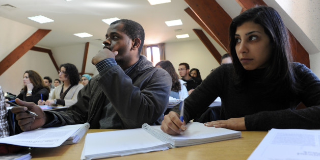 TO GO WITH AFP STORY IN FRENCH BY HERVE GUILBAUD - Students attend a class on the Campus of al Akhawayn Ifrane University on January 29, 2009 in Ifrane. The private university, inaugurated in 1995 and located at 1600 metres above sea level in the central Atlas mountains, boasts immaculate grounds and ultra moden facilities for some 1300 students from around the world who on average part with 10,000 euros a year for tuition fees. Youssra Benchrif head of external communications for the universit
