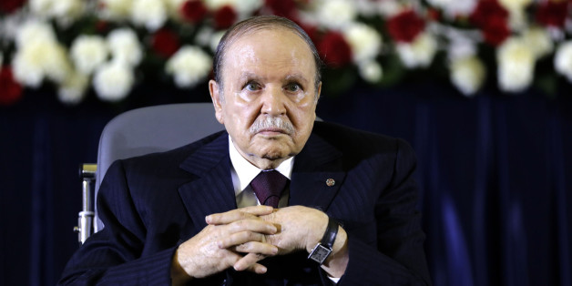 President Abdelaziz Bouteflika looks on during a swearing-in ceremony in Algiers April 28, 2014. Bouteflika was sworn in for a fourth term on Monday after easily winning an election opponents dismissed as fraudulent to re-appoint the ailing independence veteran after 15 years in power. REUTERS/Louafi Larbi (ALGERIA - Tags: POLITICS ELECTIONS)