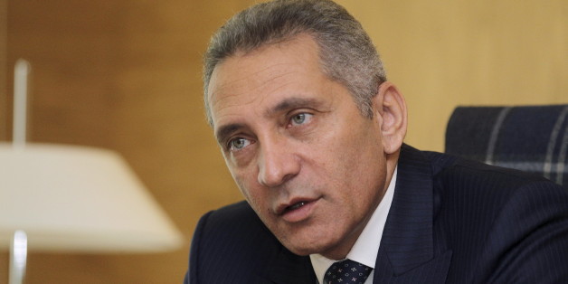 Morocco's Industry Minister Moulay Hafid Elalamy poses during an interview with Reuters in Rabat, November 2, 2015. Morocco expects auto industry exports to reach an annual 100 billion dirhams ($10.2 billion) by 2020 as a result of PSA Peugeot Citroen starting production at its new 557 million euro ($630 million) factory. Picture taken on November 2, 2015. REUTERS/Stringer