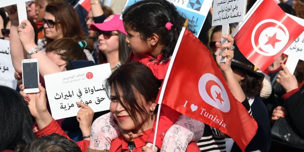 Tunisians take part in a protest to demand altering religious law concerning inheritance, on March 10, 2018, in the capital Tunis. / AFP PHOTO / FETHI BELAID (Photo credit should read FETHI BELAID/AFP/Getty Images)