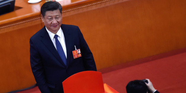 Chinese President Xi Jinping poses for a picture after voting during the third plenary session of the first session of the 13th National People's Congress (NPC) at the Great Hall of the People in Beijing on March 11, 2018.
China's rubber-stamp parliament is set on March 11, to hand President Xi Jinping free rein to rule the rising Asian superpower indefinitely, with potential abstentions offering the only suspense in the historic vote. / AFP PHOTO / WANG ZHAO (Photo credit should read WANG ZHAO/AFP/Getty Images)