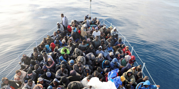 Migrants are seen in a boat as they are rescued by Libyan coast guards in the Mediterranean Sea off the coast of Libya, January 15, 2018. Picture taken January 15, 2018. REUTERS/Hani Amara