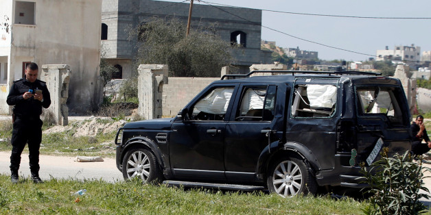 A damaged vehicle of the convoy of Palestinian Prime Minister Rami Hamdallah is seen after an explosion in the northern Gaza Strip March 13, 2018. REUTERS/Mohammed Salem