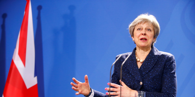 Britain's Prime Minister Theresa May during a news conference with German Chancellor Angela Merkel in Berlin, Germany, February 16, 2018. REUTERS/Hannibal Hanschke