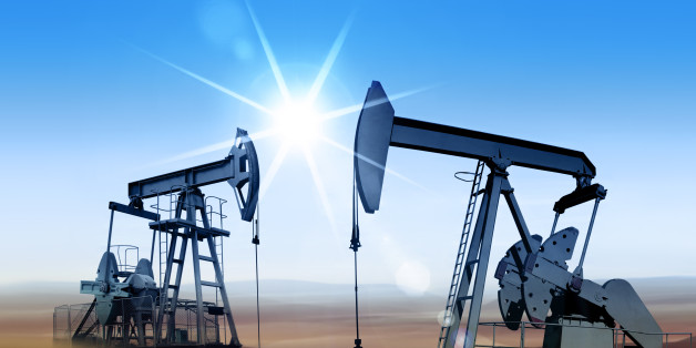 Working oil pumps in desert place of Middle East