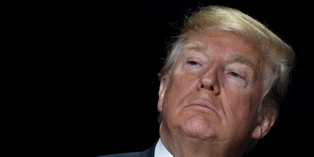 U.S. President Donald Trump listens during the National Prayer Breakfast in Washington, D.C., U.S., on Thursday, Feb. 8, 2018. Trump urged a more just and peaceful world, praised the military and U.S. advances in fighting Islamic State and reiterates support for oppressed people in Iran and North Korea. Photographer: Mike Theiler/Pool via Bloomberg