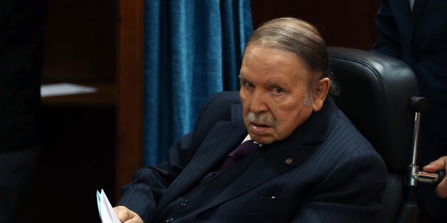 Algerian President Abdelaziz Bouteflika heads to vote at a polling station in Algiers on November 23, 2017 as Algeria goes to the polls for local elections. (Photo by Billal Bensalem/NurPhoto via Getty Images)