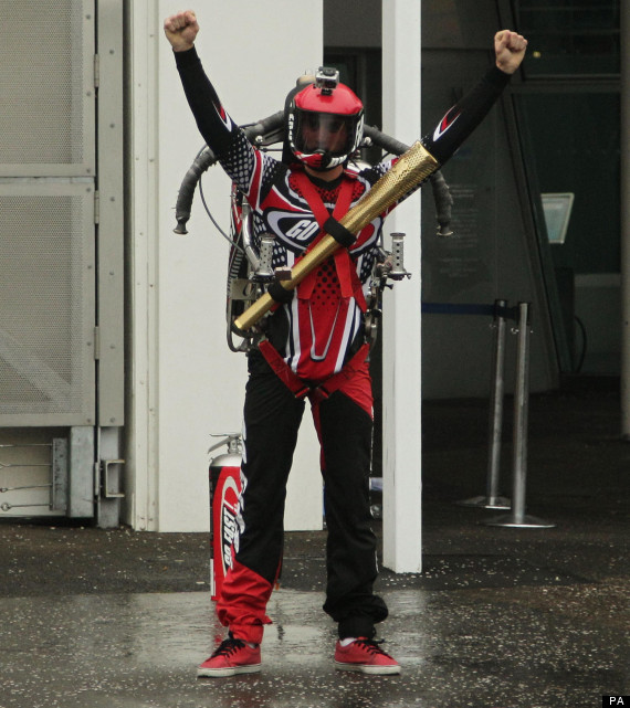 Jetpack Man Carries Olympic Torch At National Space Centre (VIDEO
